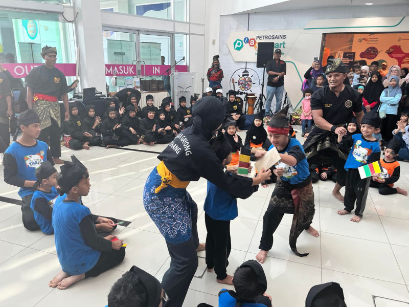 School assembly with students and faculty