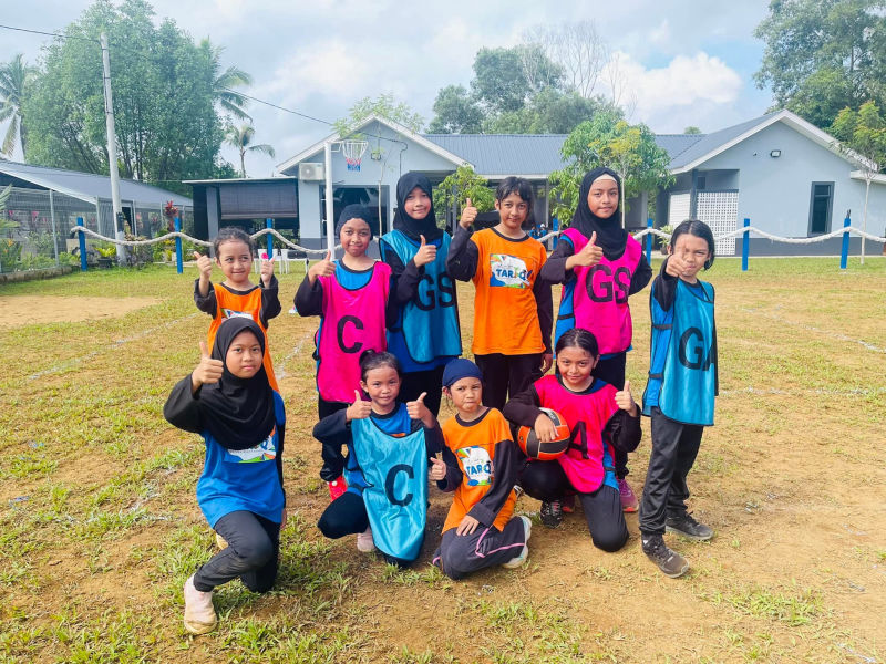 Teacher guiding a student